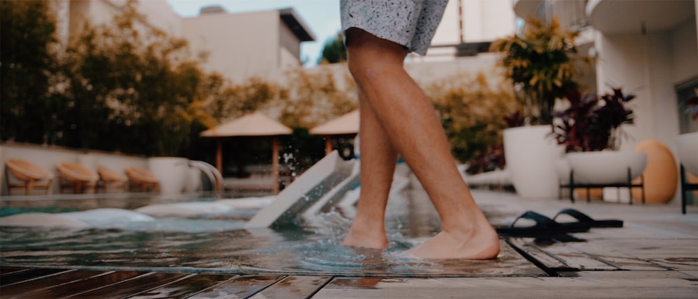 person standing near body of water