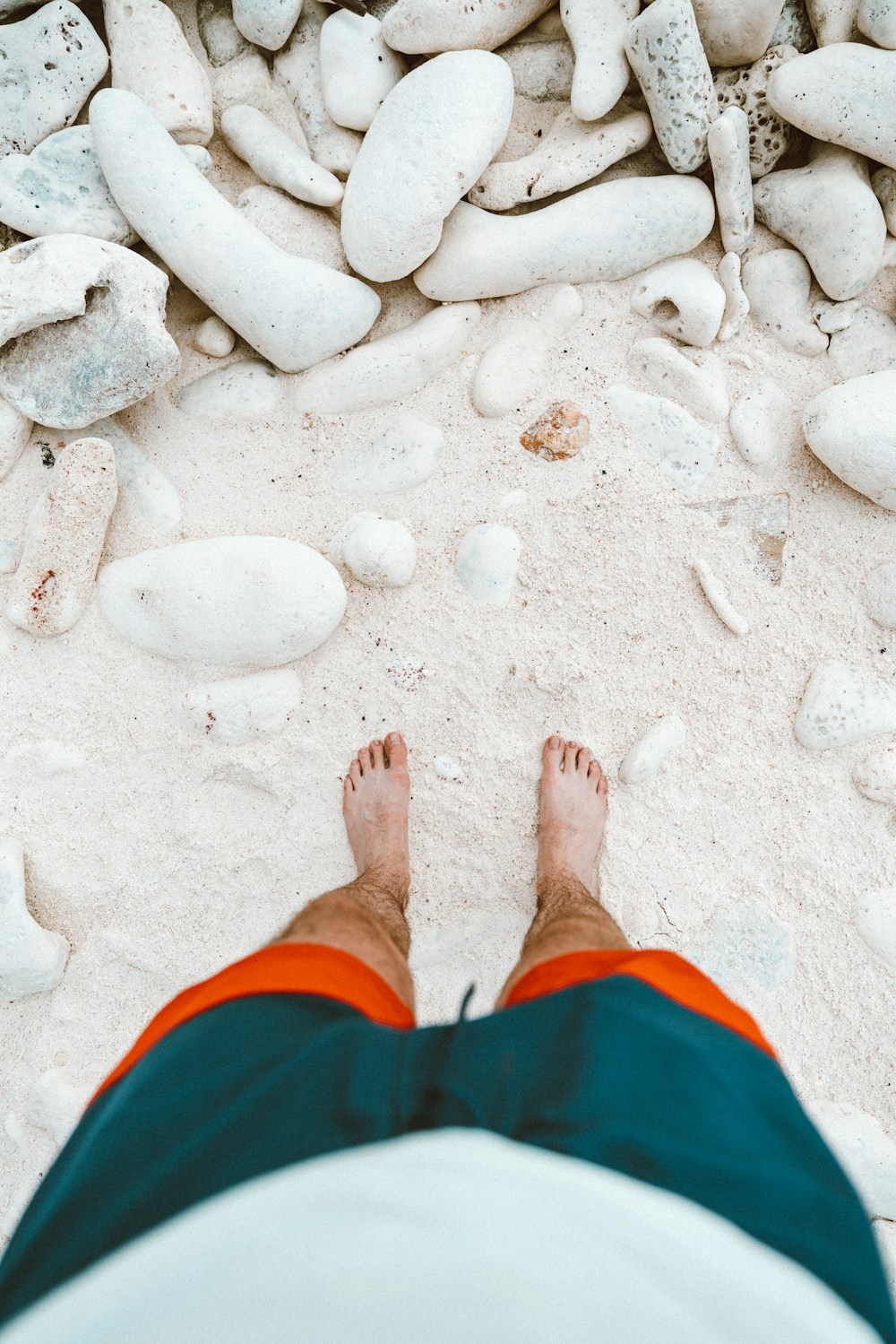 Bare feet on a smooth river stone
