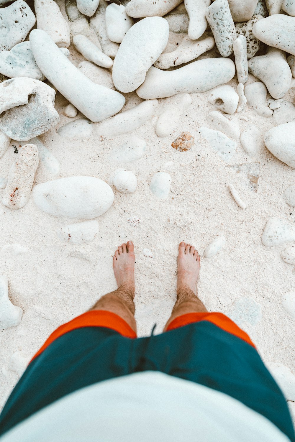 person standing on sand