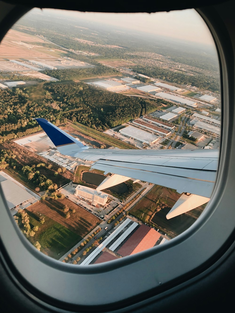 aerial photography of house inside airplane