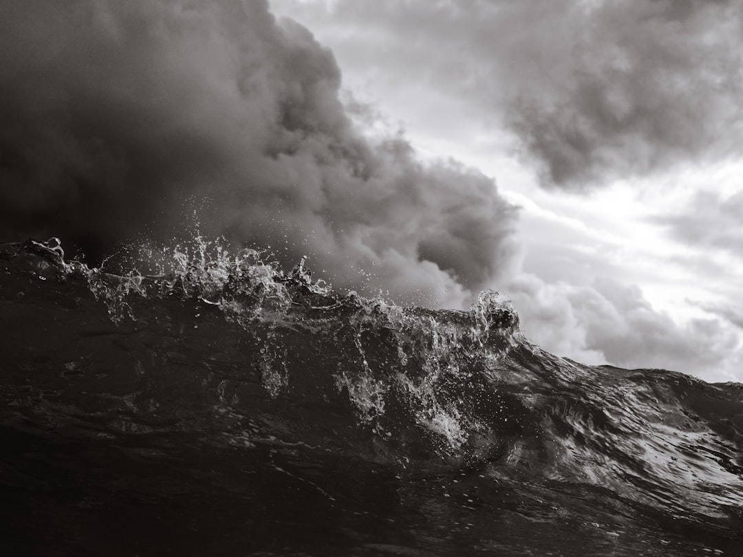 grayscale photography of rocky mountain,