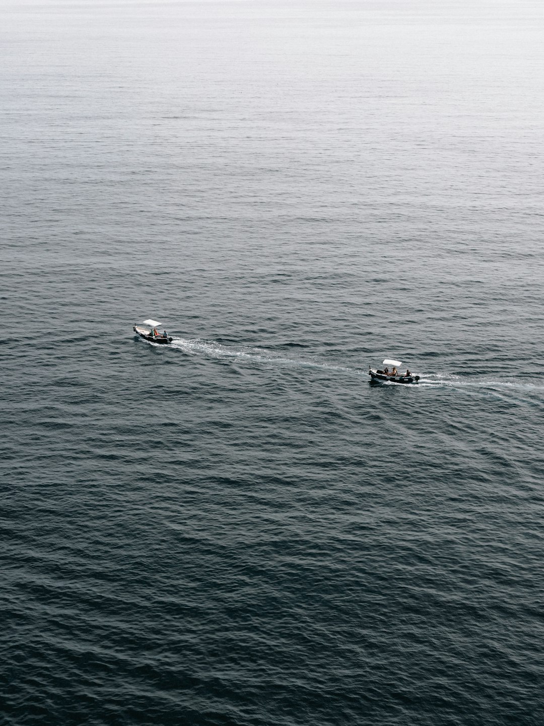 two boats on ocean