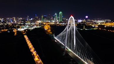 aerial photography of steel bridge during nighttime