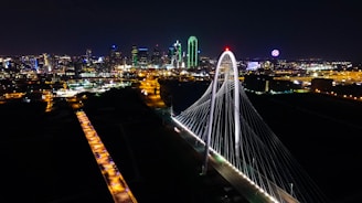 aerial photography of steel bridge during nighttime