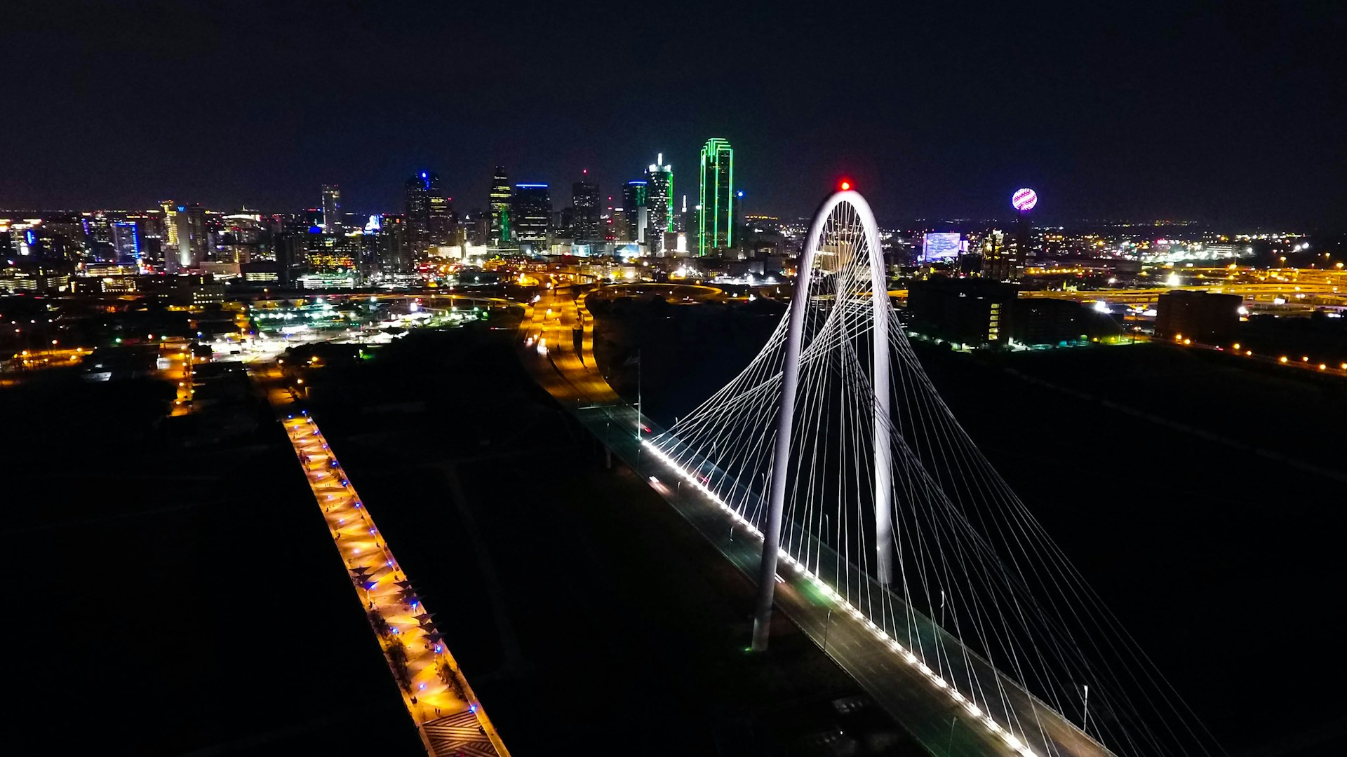 aerial photography of steel bridge during nighttime