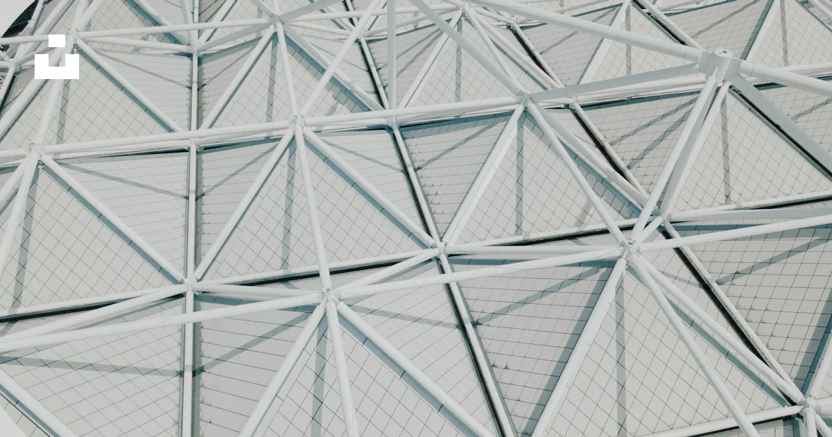 A close up of a building with a very large triangular structure photo ...