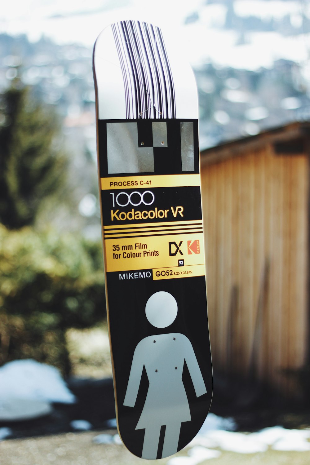 tilt shift lens photography of 1000 Kodacolor VR skateboard deck