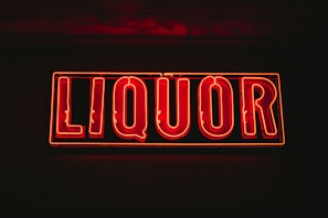 red liquor neon signage