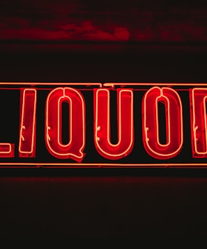 red liquor neon signage