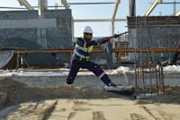 man standing near rods