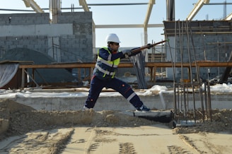 man standing near rods