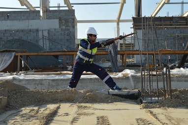 man standing near rods