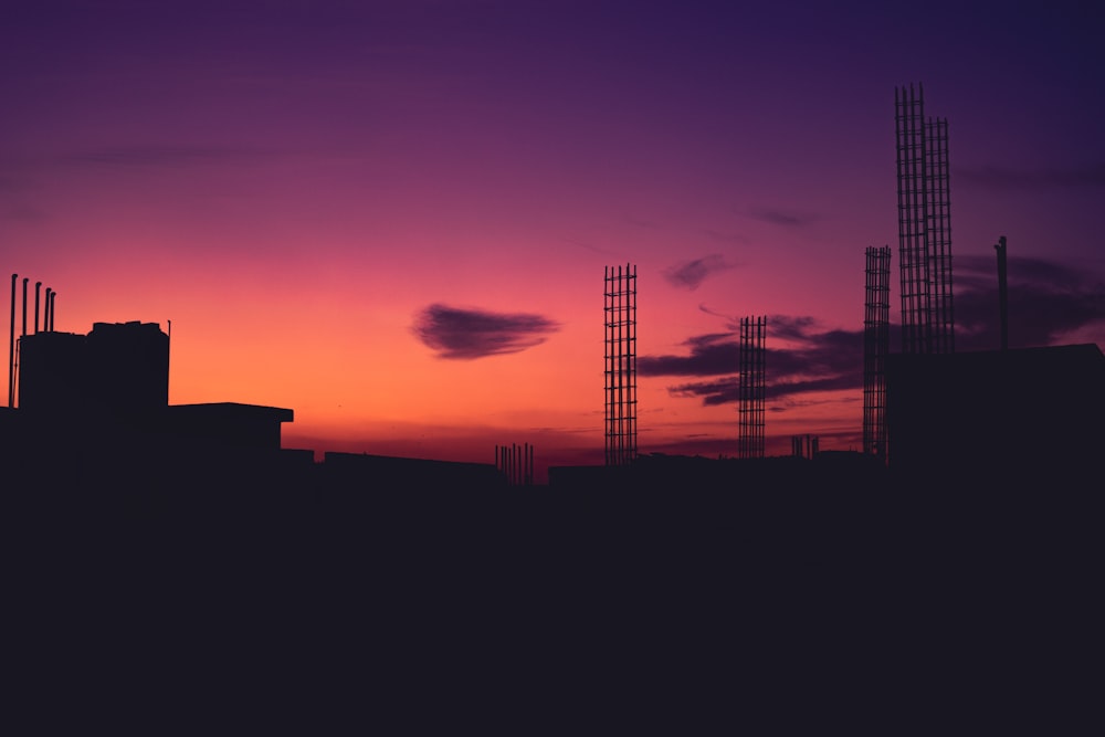 silhouette photo of building during golden hour