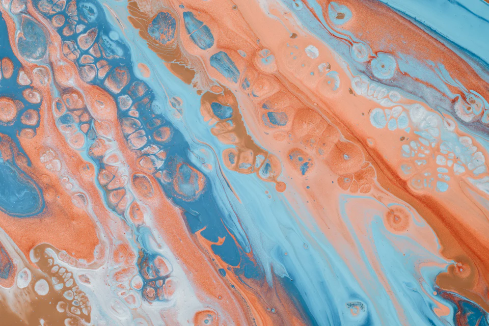 Vibrant abstract painting with textured surface, featuring scattered small dots and contrasting colors