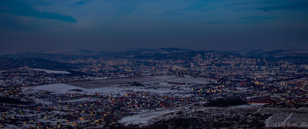 aerial photo of city buildings during nighttime