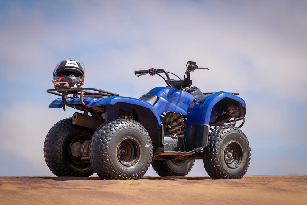 off-road helmet on blue ATV