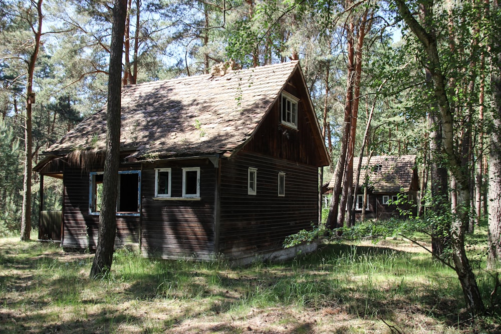 brown wooden house near trees