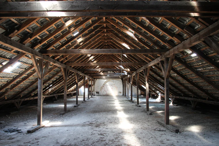 Interior of an uninsulated wood-framed shop building