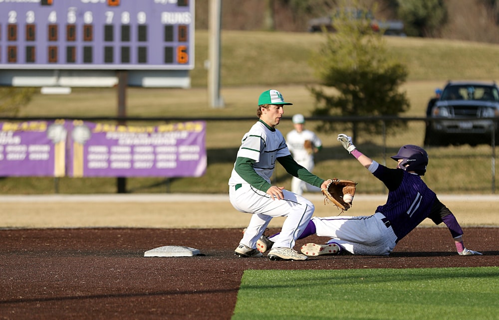 man catching baseball