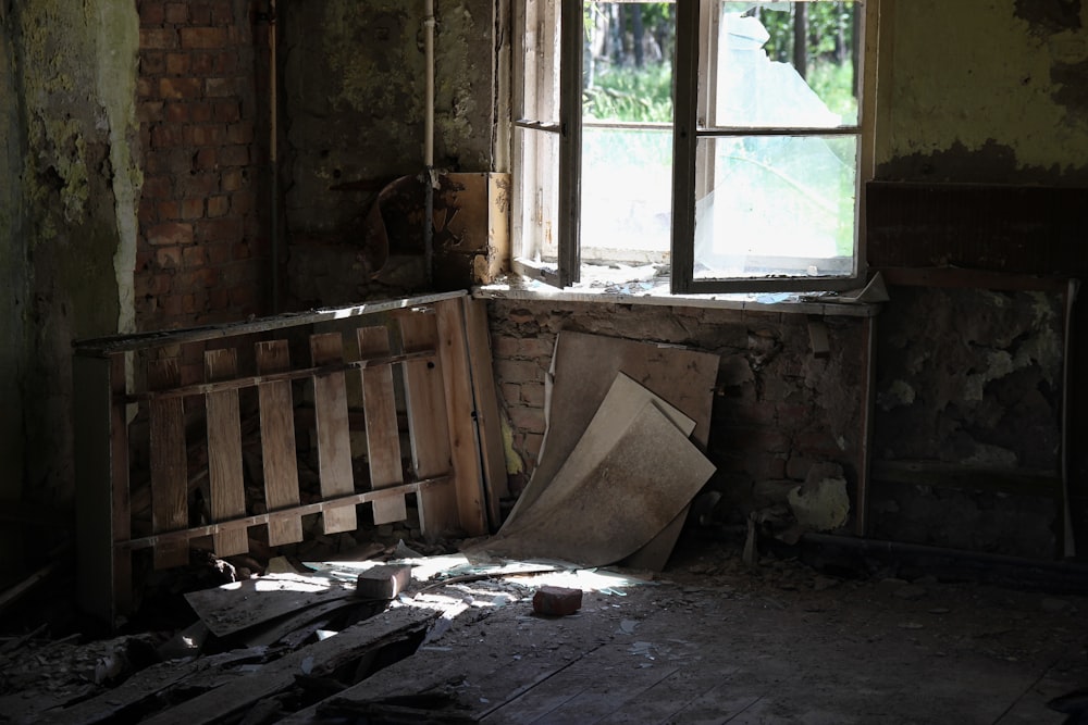 brown wooden board inside abandoned house