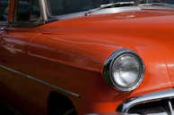 Before and after shots of a vintage car transformed with contemporary body parts and facelift.