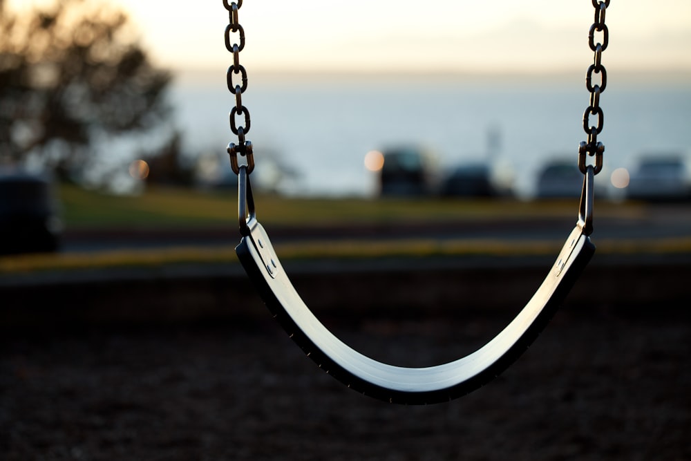 vacant gray outdoor swing