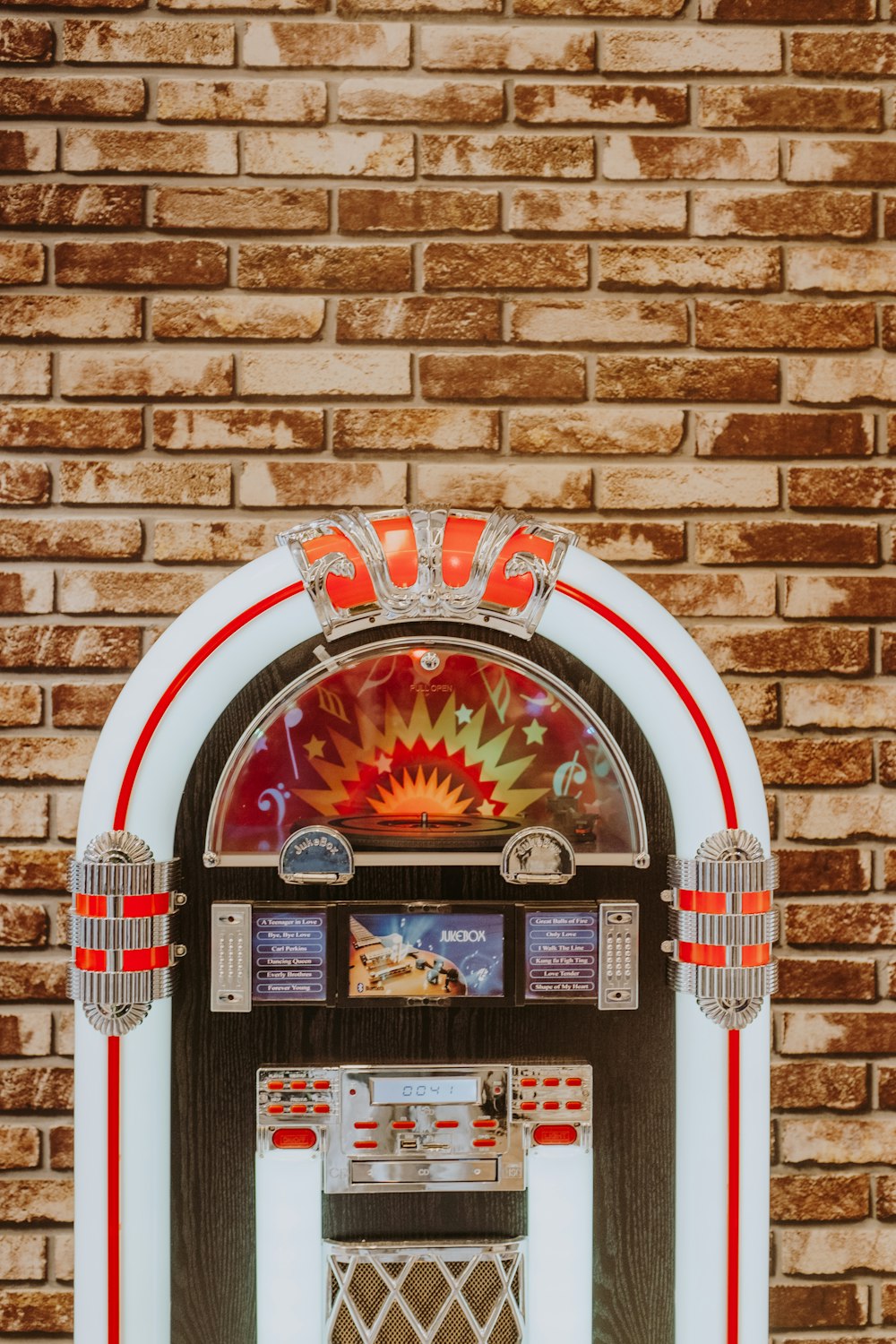 white and brown jukebox