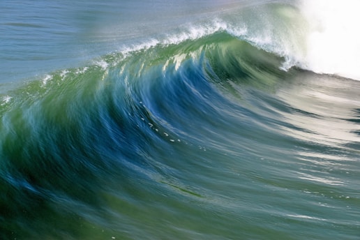 Artistic depiction of a tsunami wave blending with scientific oceanographic elements.