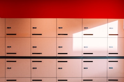 white and red wooden cabinet