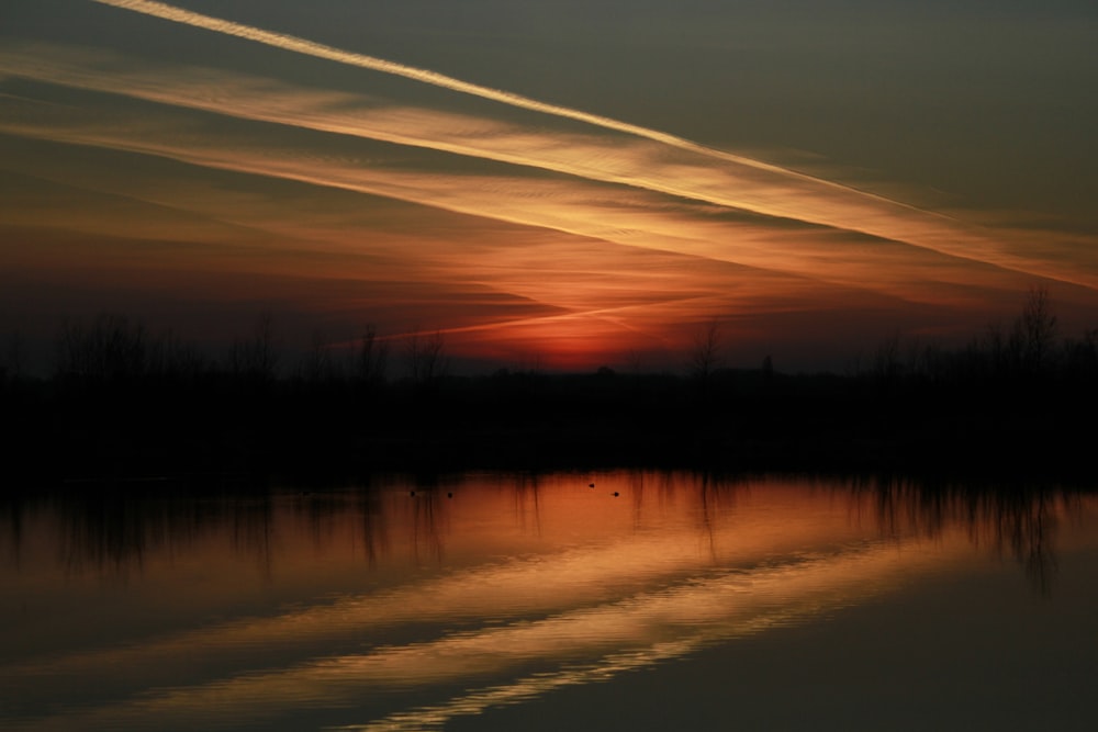 sunset over the calm river