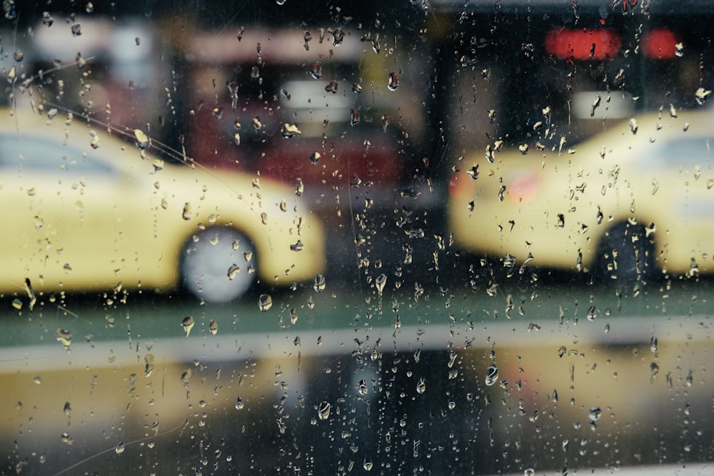 clear glass window panel with water droplets