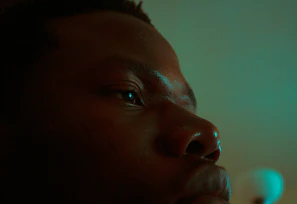 Close-up of a client’s radiant skin after a rejuvenating facial treatment in a softly lit studio