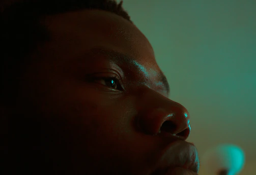 Softly lit close-up of a client’s glowing skin after a facial treatment at Riss Beauty.