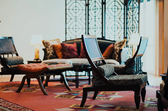 Cozy and modern apartment living room in Marrakech with warm lighting and traditional decor accents.