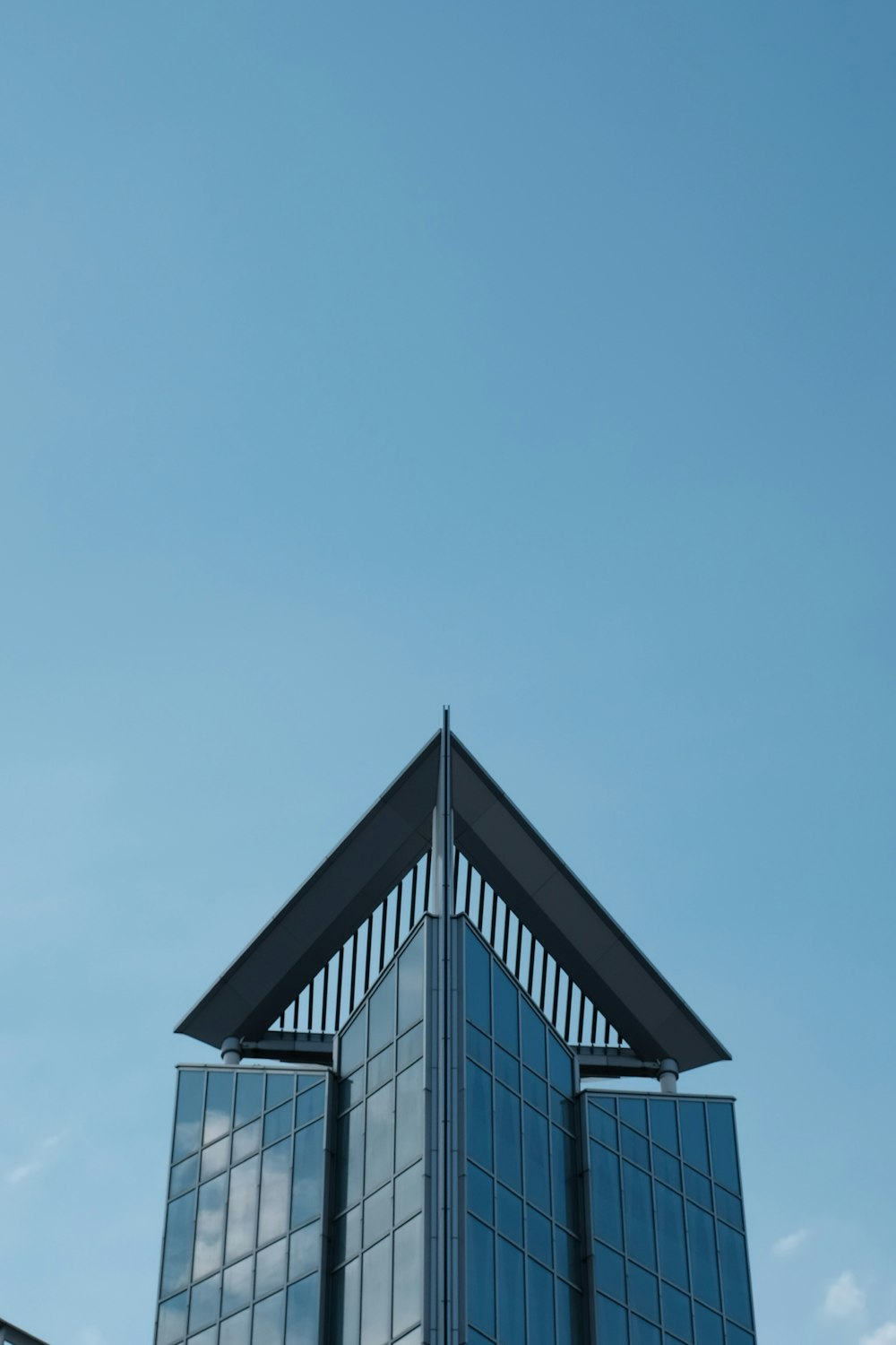 curtain wall building under blue sky