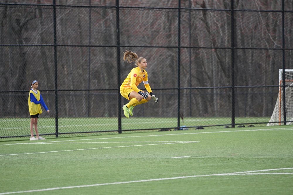 woman playing soccer