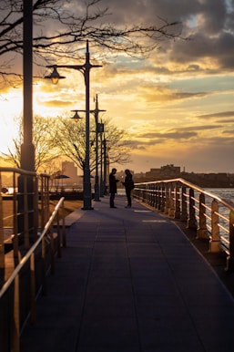 2 people standing on the pathway