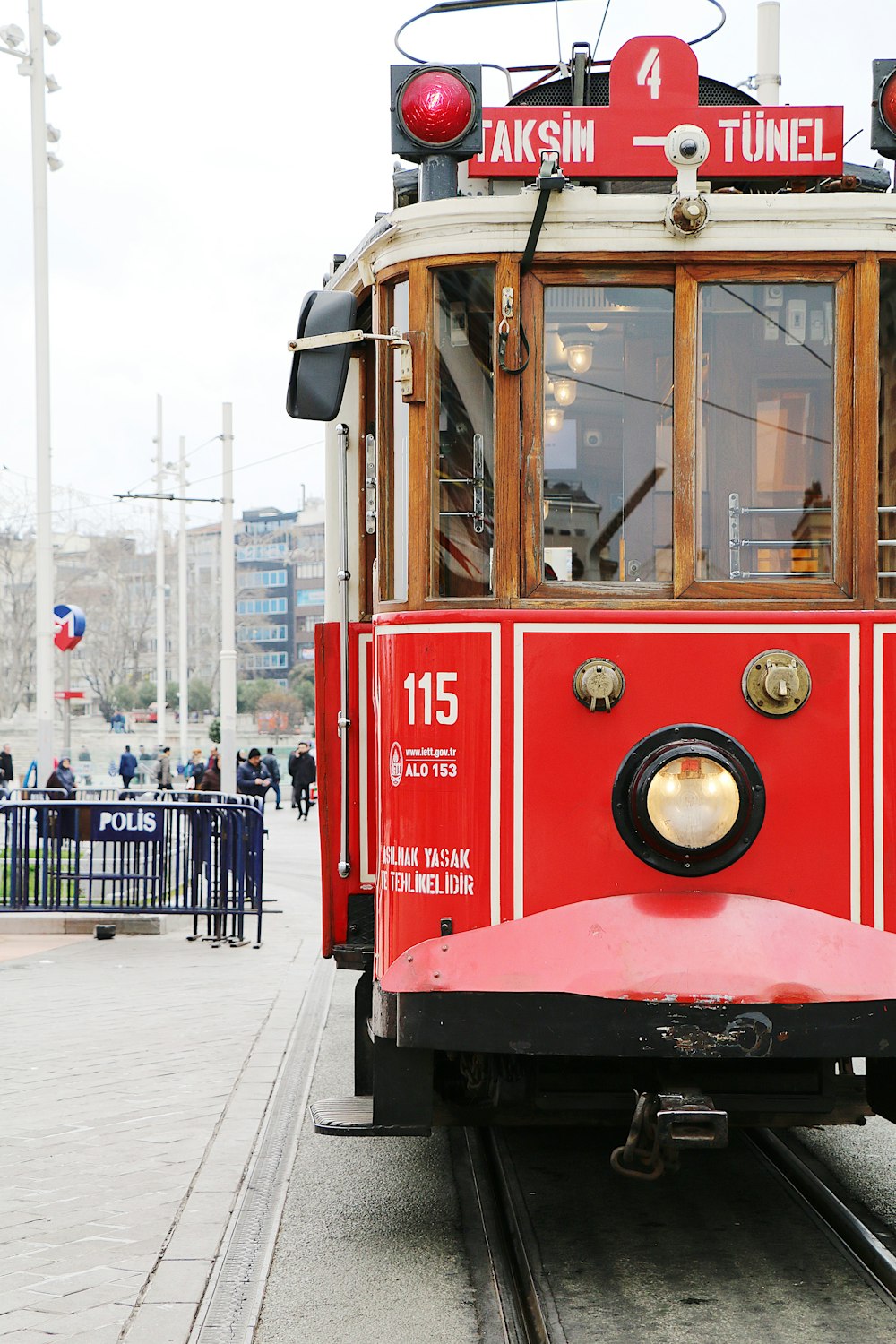 red and brown train during daytime