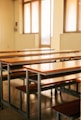 brown and gray wooden tables and chairs