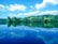 A serene landscape with a calm lake reflecting the sky, symbolizing tranquility and emotional reset.