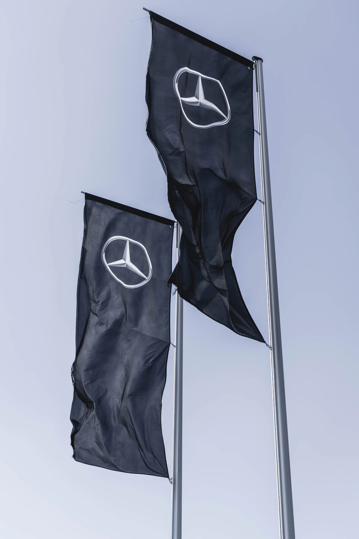 Tall promotional banners displayed outdoors