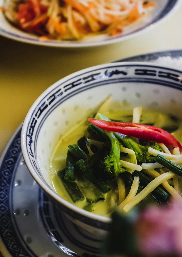 Green Thai curry with vegetables in a bowl
