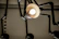Artistic 3D rendering of a modern industrial lamp with brushed metal and soft lighting.