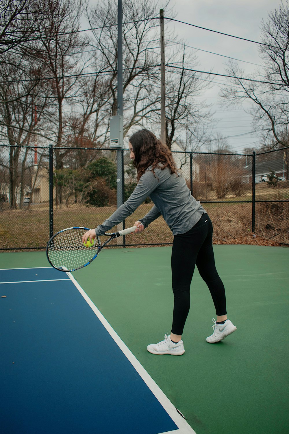 woman serving ball