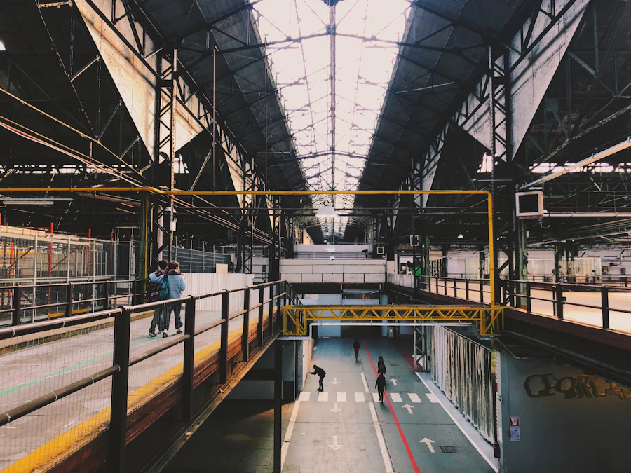 Industrial manufacturing hall with overhead structure and equipment