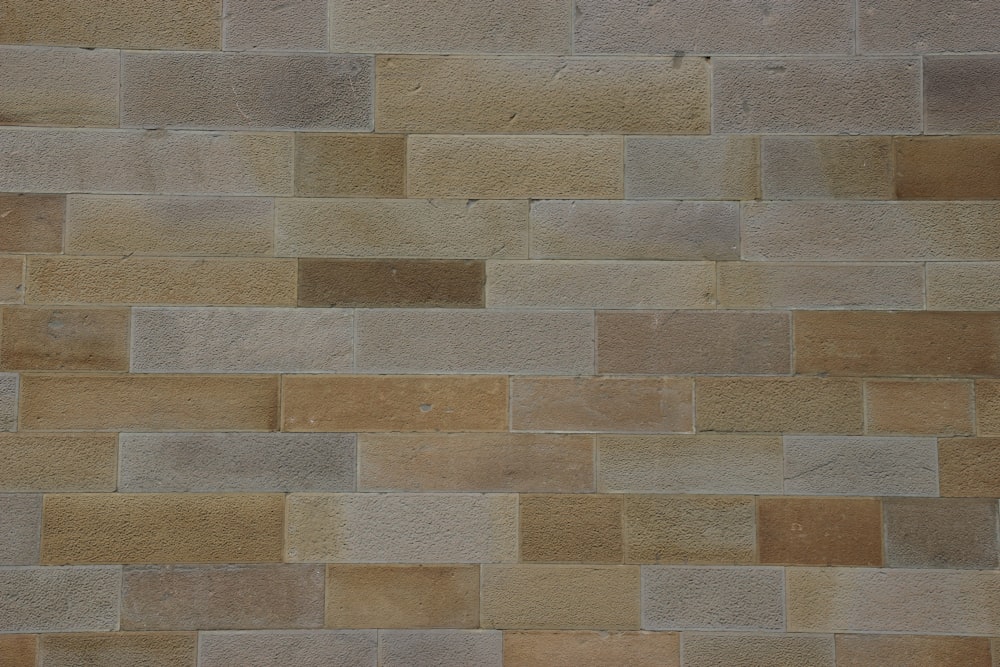 brown and gray bricked wall
