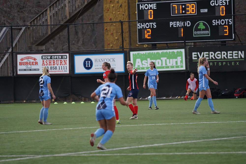 women playing football