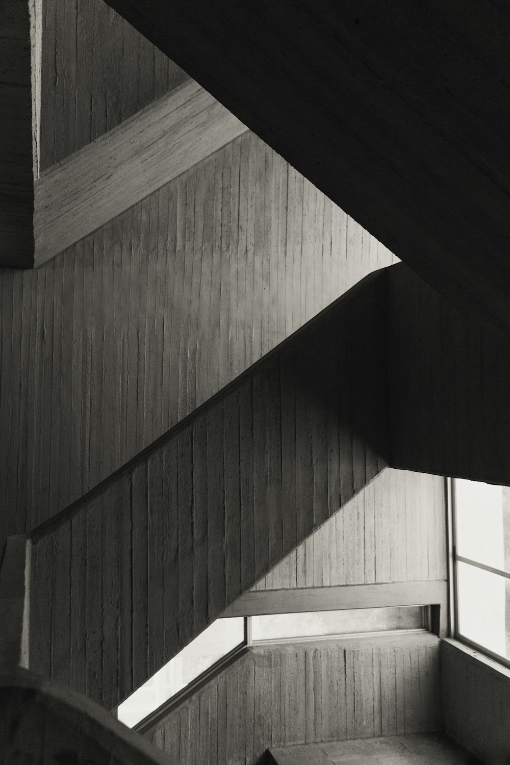 a black and white photo of a staircase