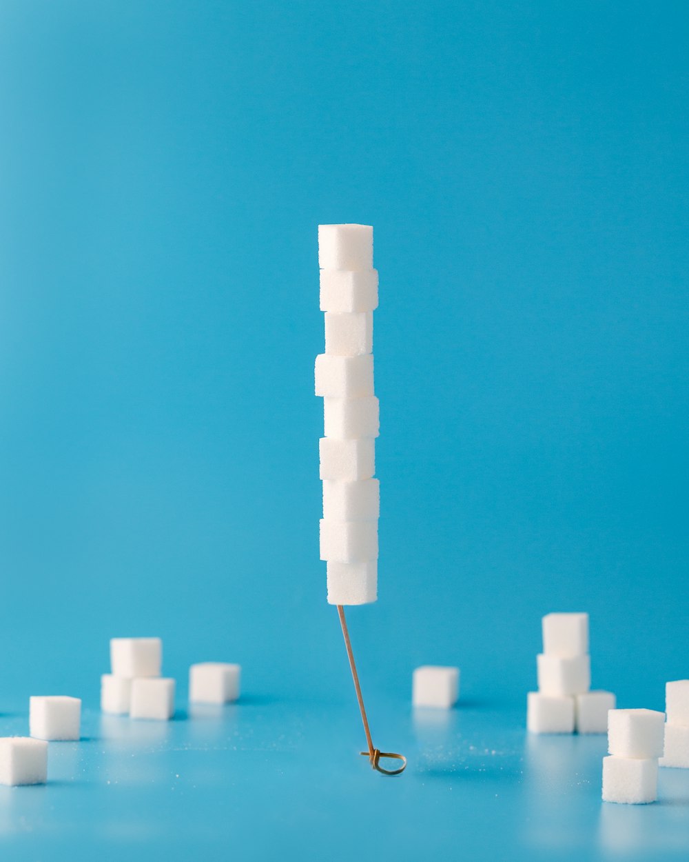 white cubes on blue surface