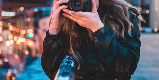 woman using camera